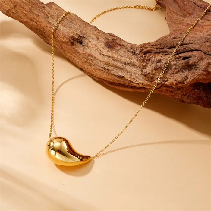 Hollow Teardrop Pendant Jewelry Set – Gold-Plated Stainless Steel Earrings, Bracelet & Necklace for Women | Modern Minimalist Design | Wholesale