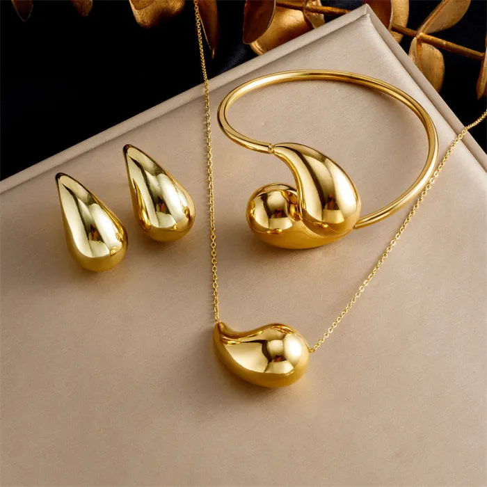 Hollow Teardrop Pendant Jewelry Set – Gold-Plated Stainless Steel Earrings, Bracelet & Necklace for Women | Modern Minimalist Design | Wholesale