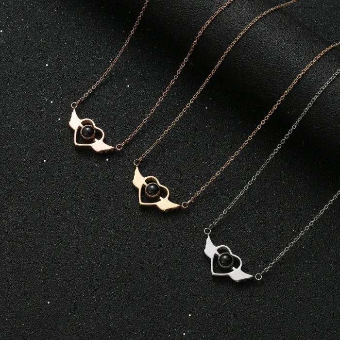 Angel Wings Projection Necklace – 100 Languages "I Love You" Pendant for Women | Romantic Heart Wing Design | Stainless Steel Jewelry | Wholesale